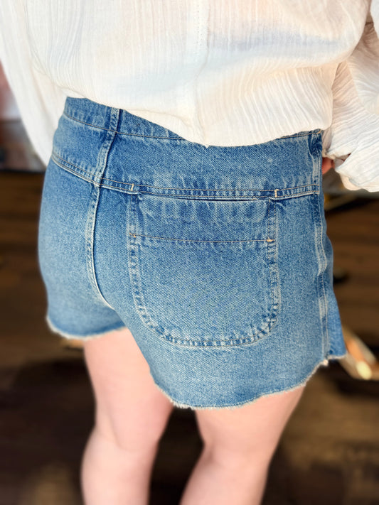 model wearing denim skirt from the back