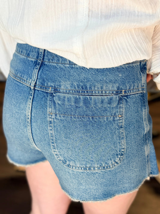 model wearing denim skirt from the back