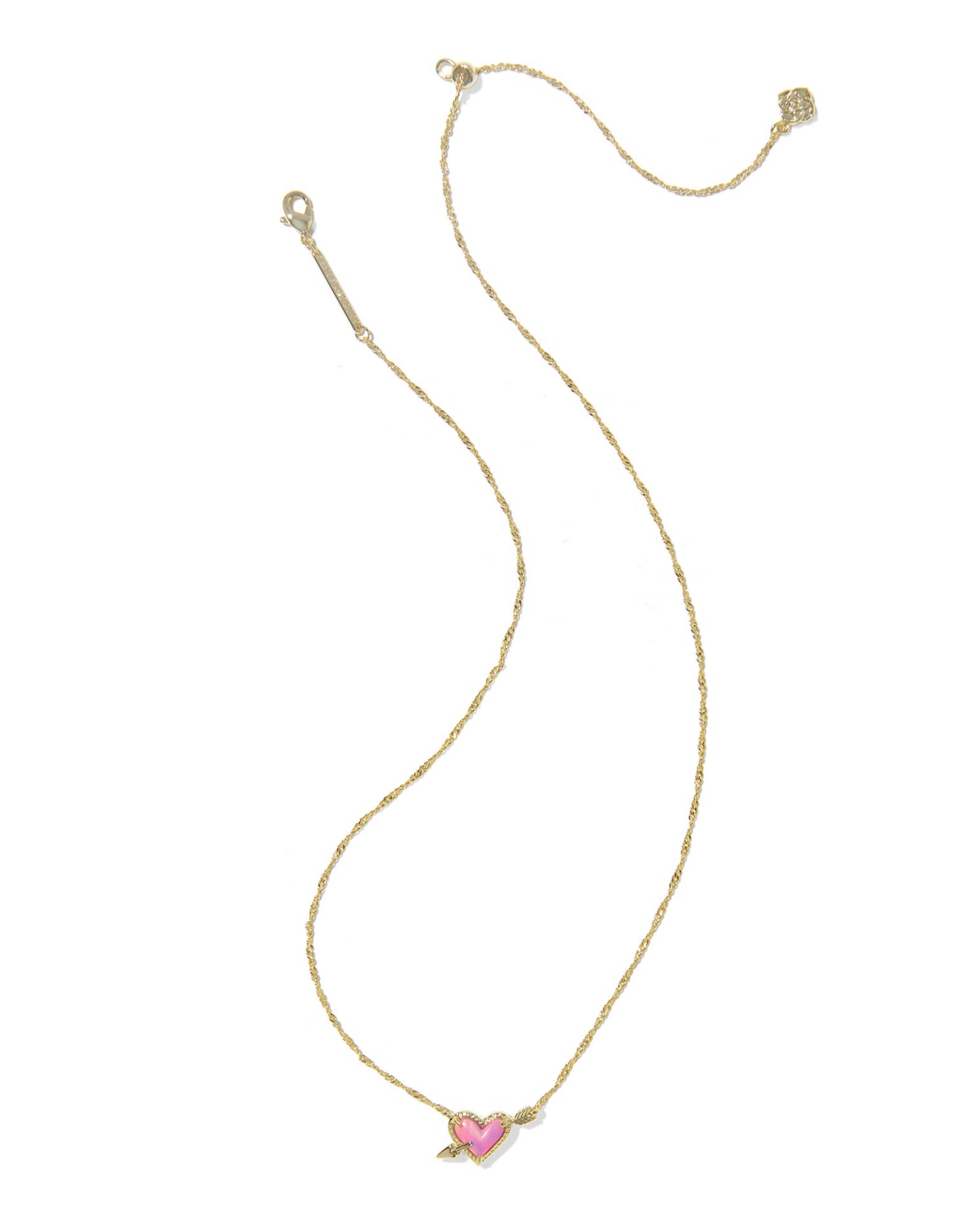 Gold necklace with a pink heart pendant on a white background