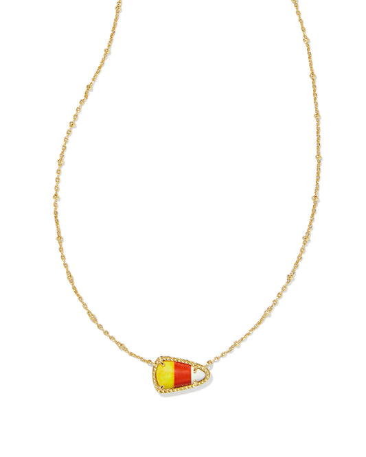 A gold-toned necklace with a short pendant featuring a candy corn design, surrounded by a decorative border.