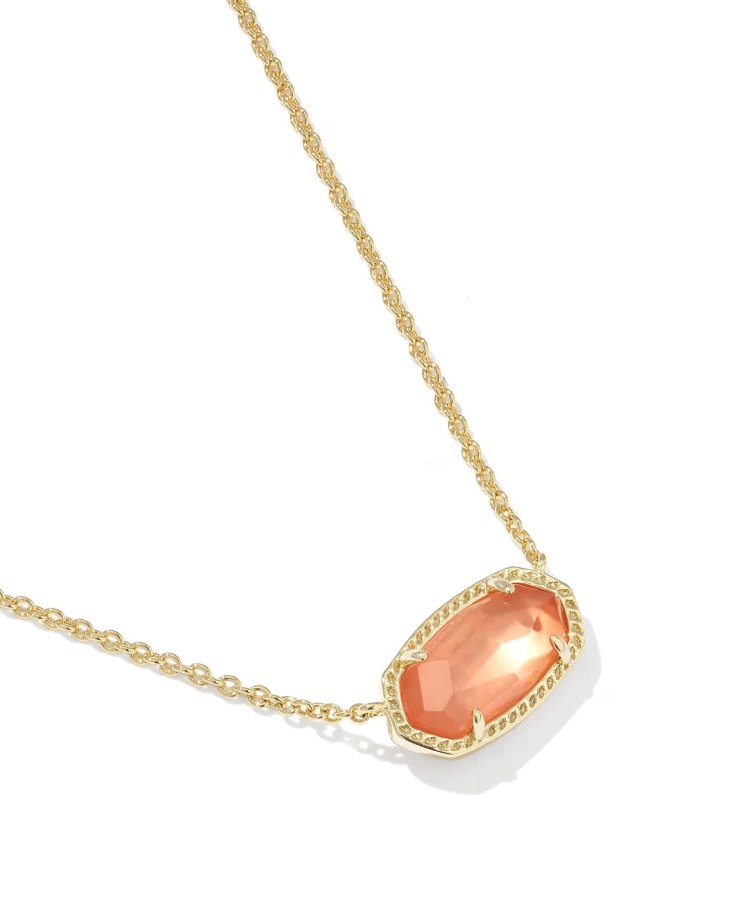 gold pendant necklace with orange stone