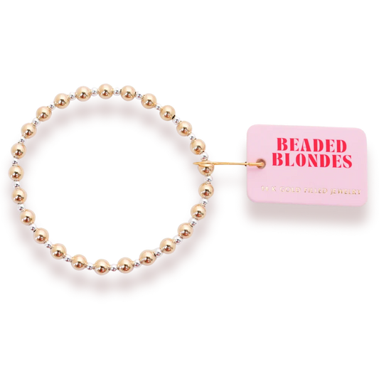 Beaded Blondes Katy Bracelet in Gold with Silver, showing mixed bead sizes and metal tones beside a pink tag.