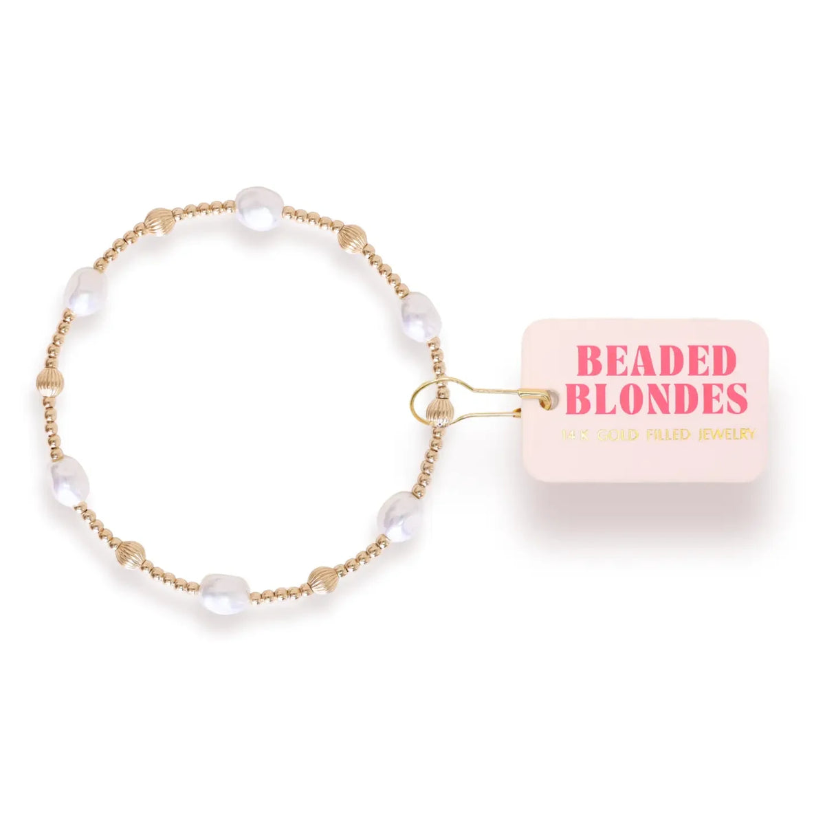 Beaded Blondes Maggie Fluted Bracelet in Gold with white pearls, fluted gold beads and a pink tag.
