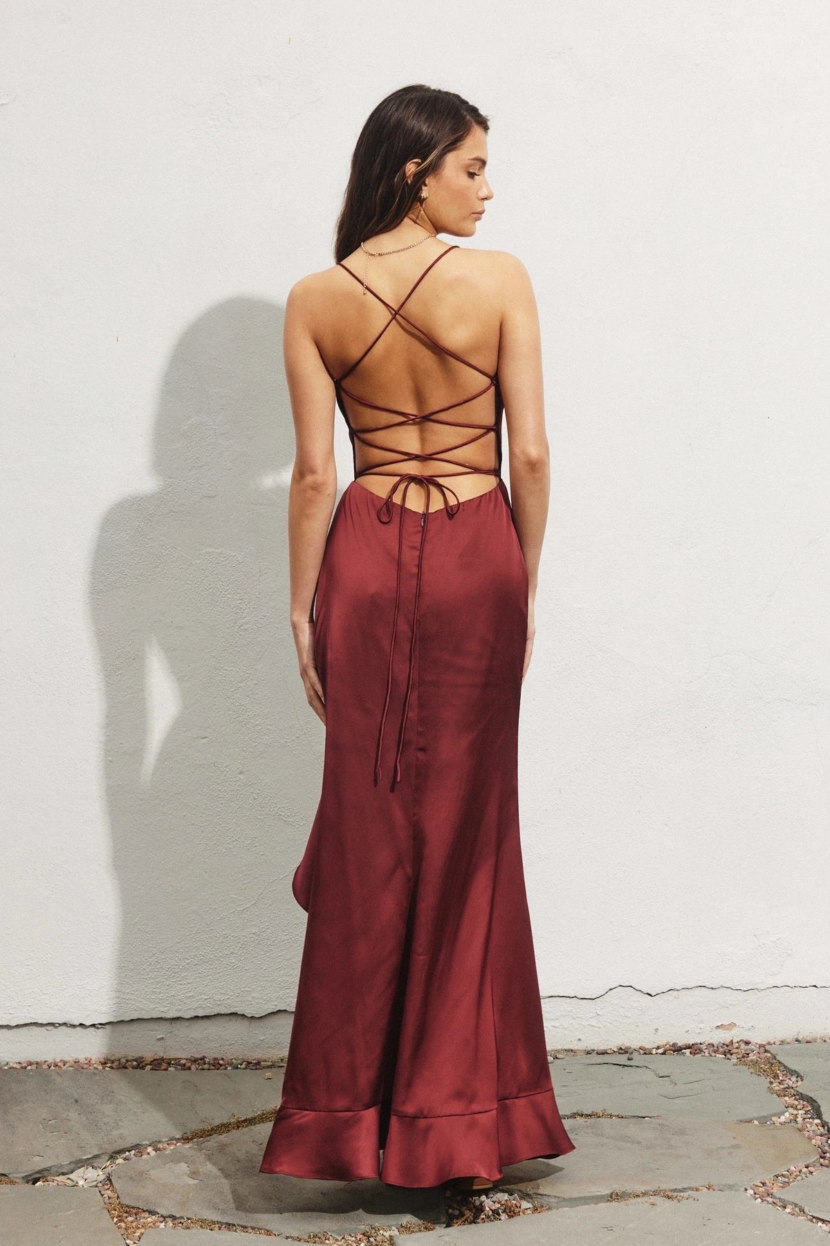 DRESS FORUM Going Out Open Back Ruffled Maxi Dress in Sangria, back view.