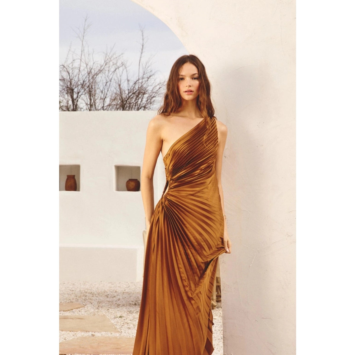 DRESS FORUM Olympia Asymmetrical Pleated Dress in Golden Ochre, front 2 view.