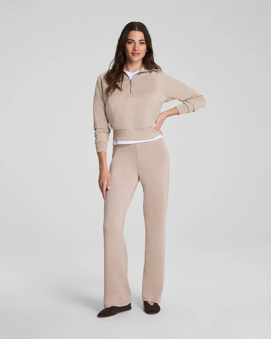 BRITIQUE BOUTIQUE MODEL WEARING SPANX HALF ZIP PULLOVER AND STRAIGHT LEG PANTS SET IN DUNE