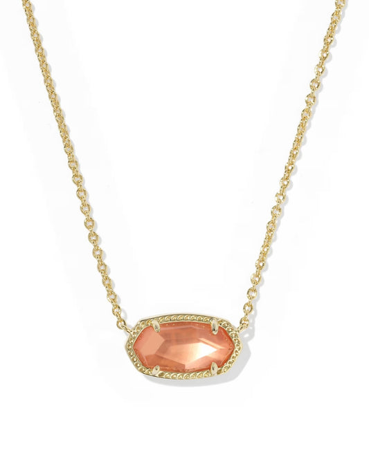 gold pendant necklace with orange stone