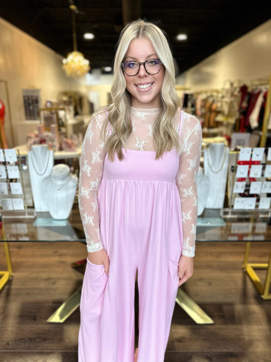 BOUTIQUE FREE PEOPLE HOT SHOT STRAPPY ONSIE POWDER PINK FRONT ON MODEL