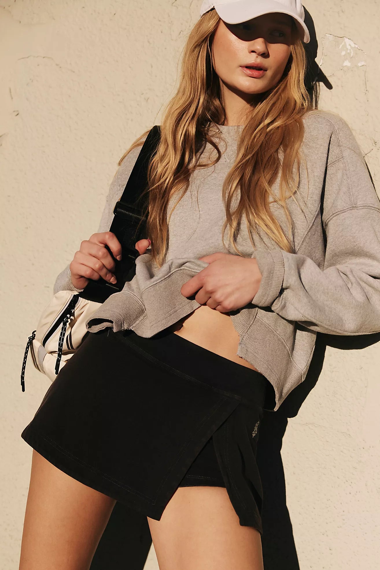 BOUTIQUE FREE PEOPLE MOVEMENT HOT SHOT MINI SKORT BLACK FRONT