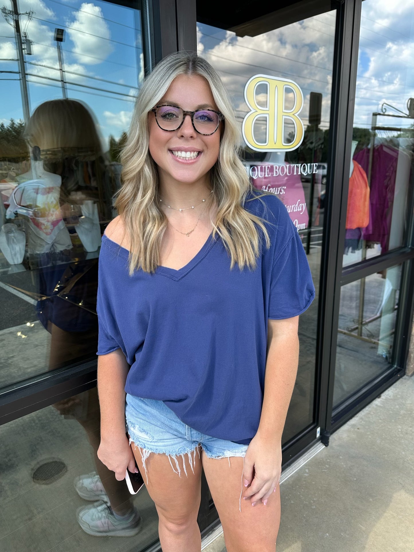 BOUTIQUE FREE PEOPLE WE THE FREE NINA V NECK TEE INDIGO PURA BLUE ON MODEL FRONT