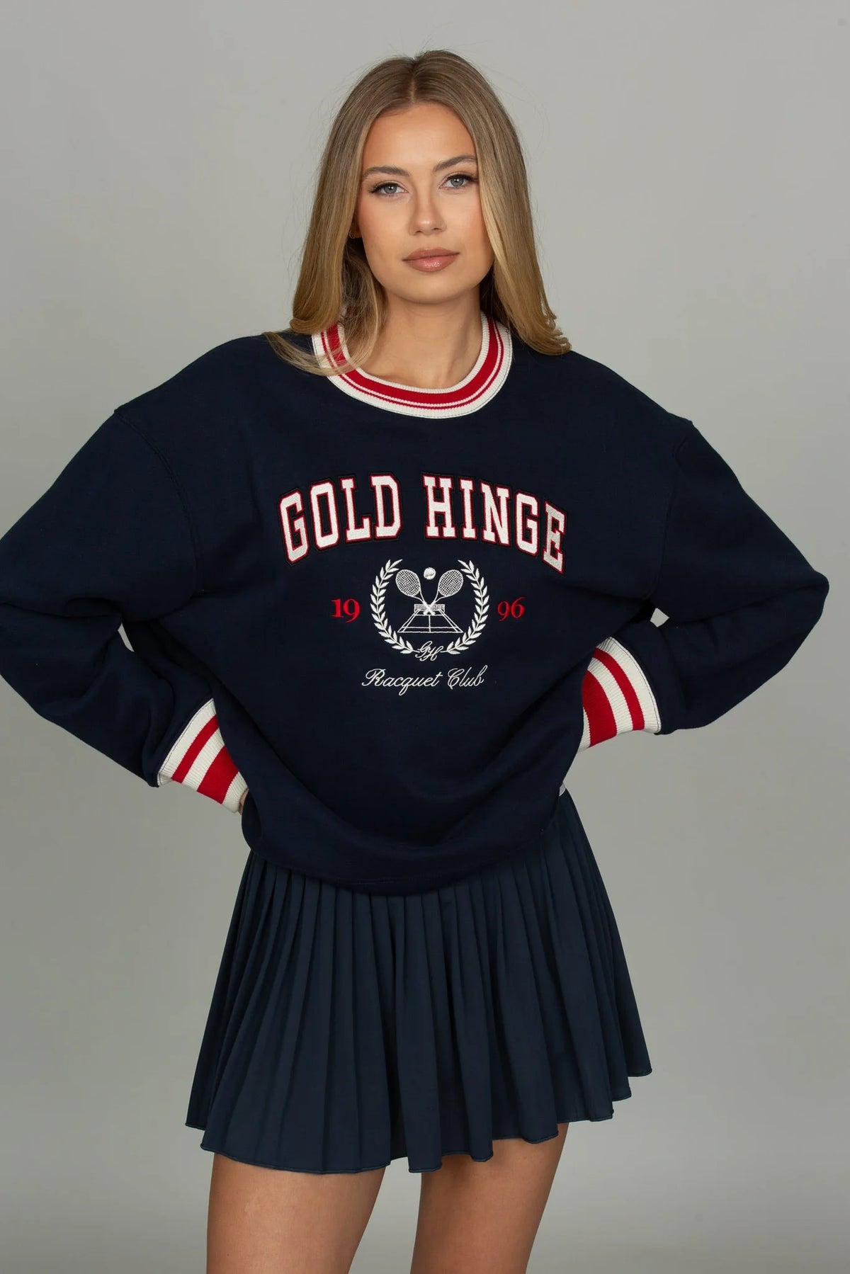 GOLD HINGE Pleated Tennis Skirt in Dark Navy, high-waisted pleated skort