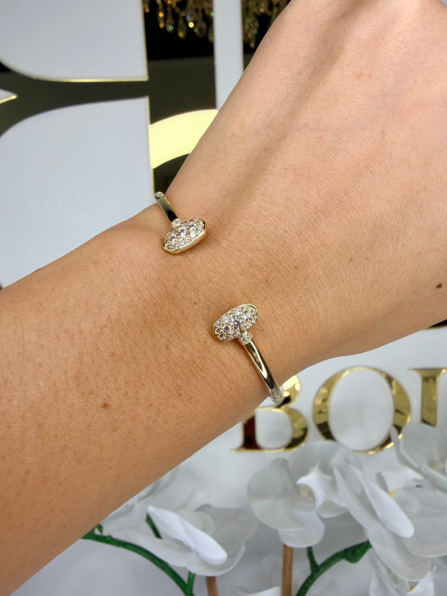 Kendra Scott gold cuff with crystals