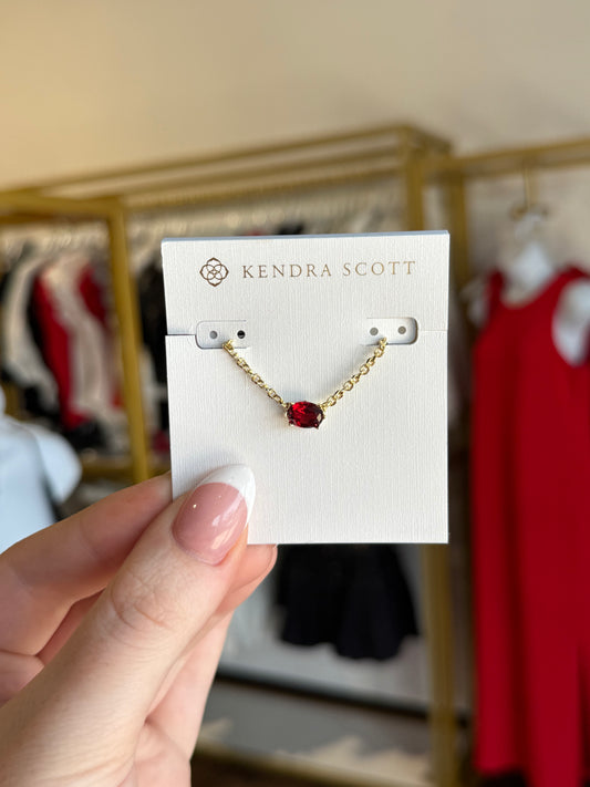 BOUTIQUE KENDRA SCOTT CAILIN GOLD PENDANT NECKLACE RED CRYSTAL IN HAND