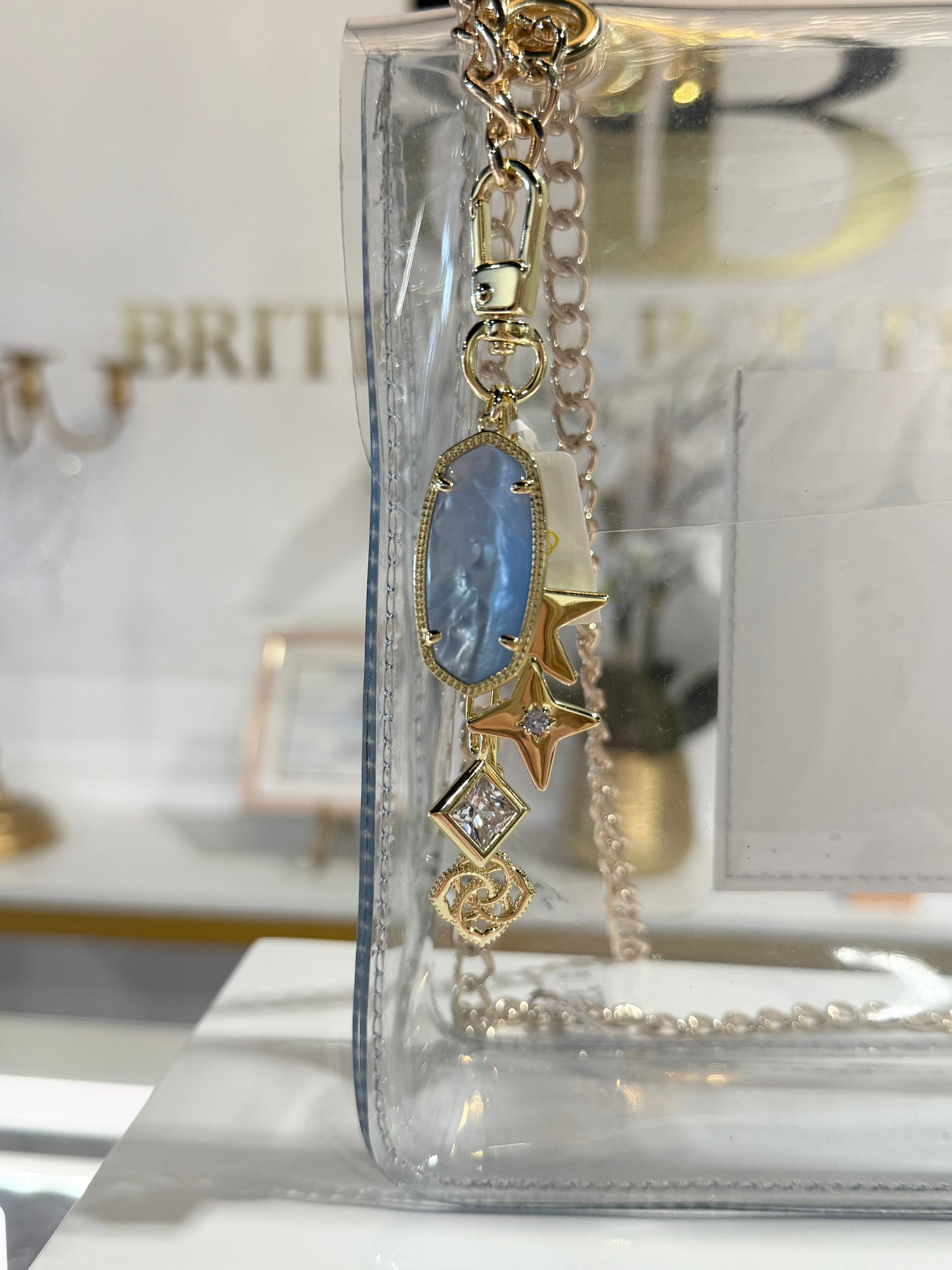 BOUTIQUE KENDRA SCOTT GAME DAY BAG CHARM LIGHT BLUE MIX ON BAG