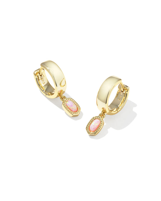 Gold Kendra Scott hoop earrings with pink gemstones on a white background