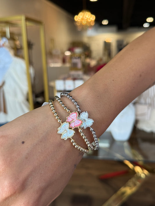 BOUTIQUE KENDRA SCOTT HALEY BOW STRETCH BRACELET GOLD