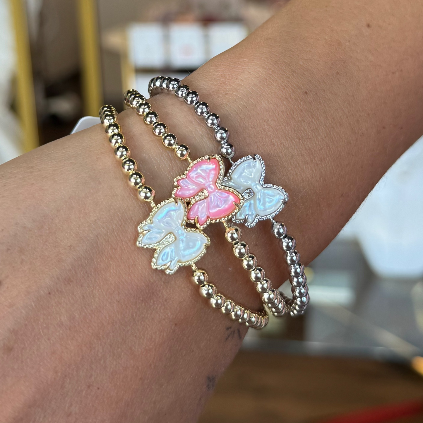 BOUTIQUE KENDRA SCOTT HALEY BOW STRETCH BRACELET GOLD