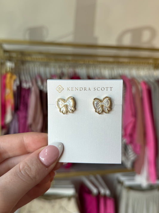 BOUTIQUE KENDRA SCOTT HALEY BOW STUD EARRINGS GOLD IVORY MOTHER OF PEARL IN HAND