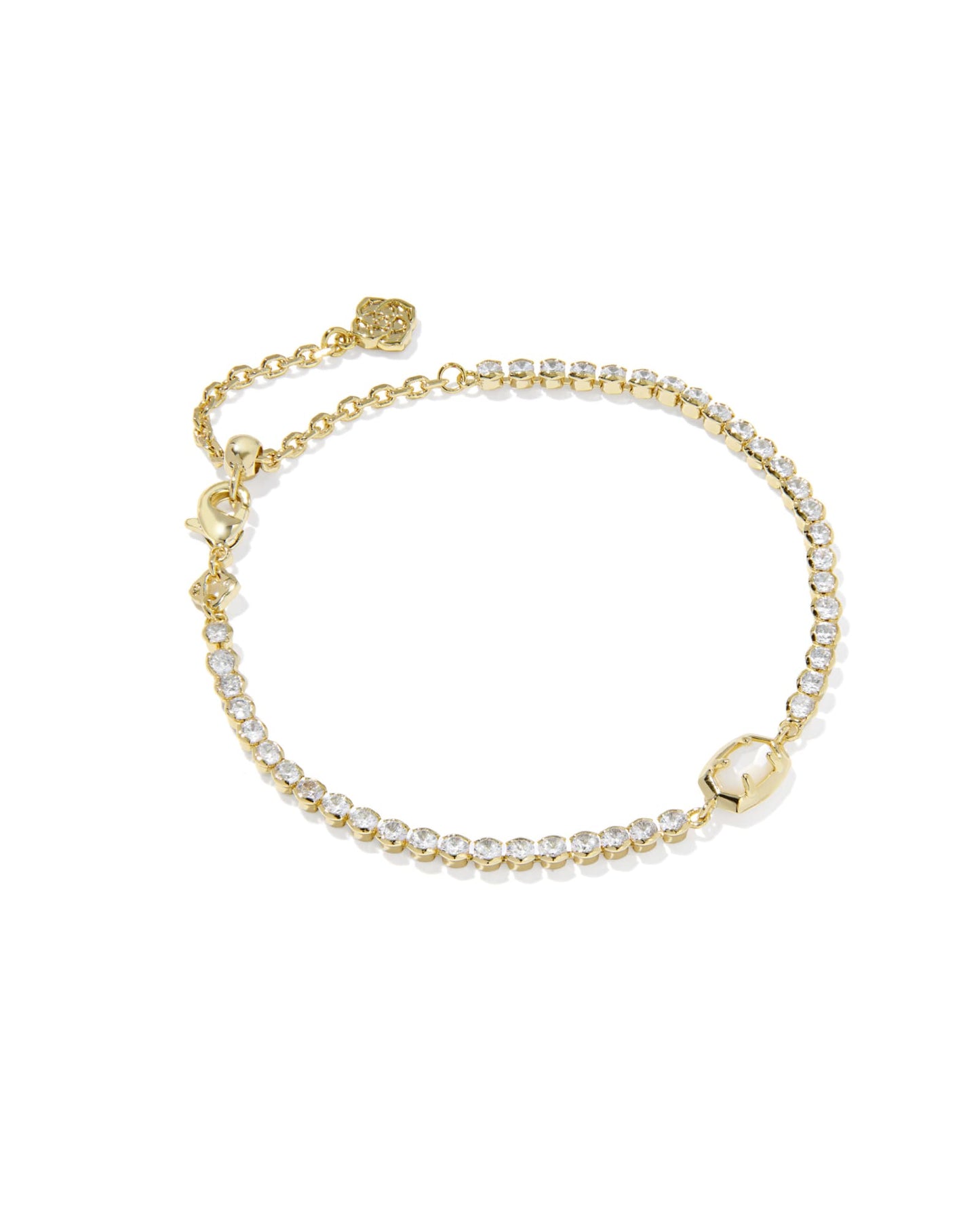 Gold bracelet with pearls on a white background