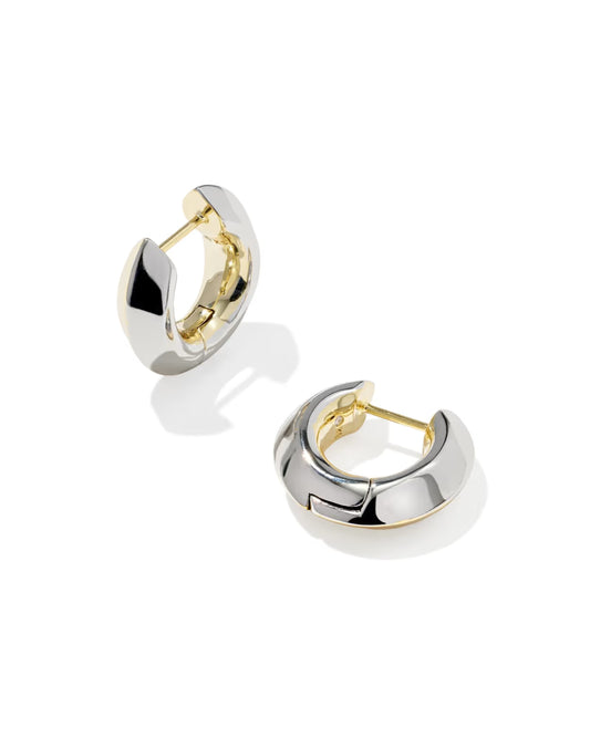 Gold and silver hoop earrings on a white background