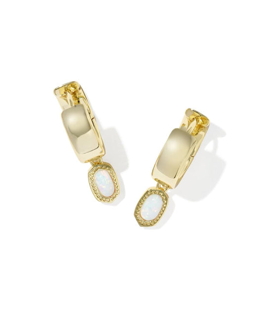 Gold hoop earrings with white stone accents on a white background