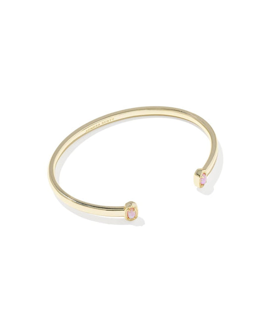 Kendra Scott gold cuff bracelet with pink stone