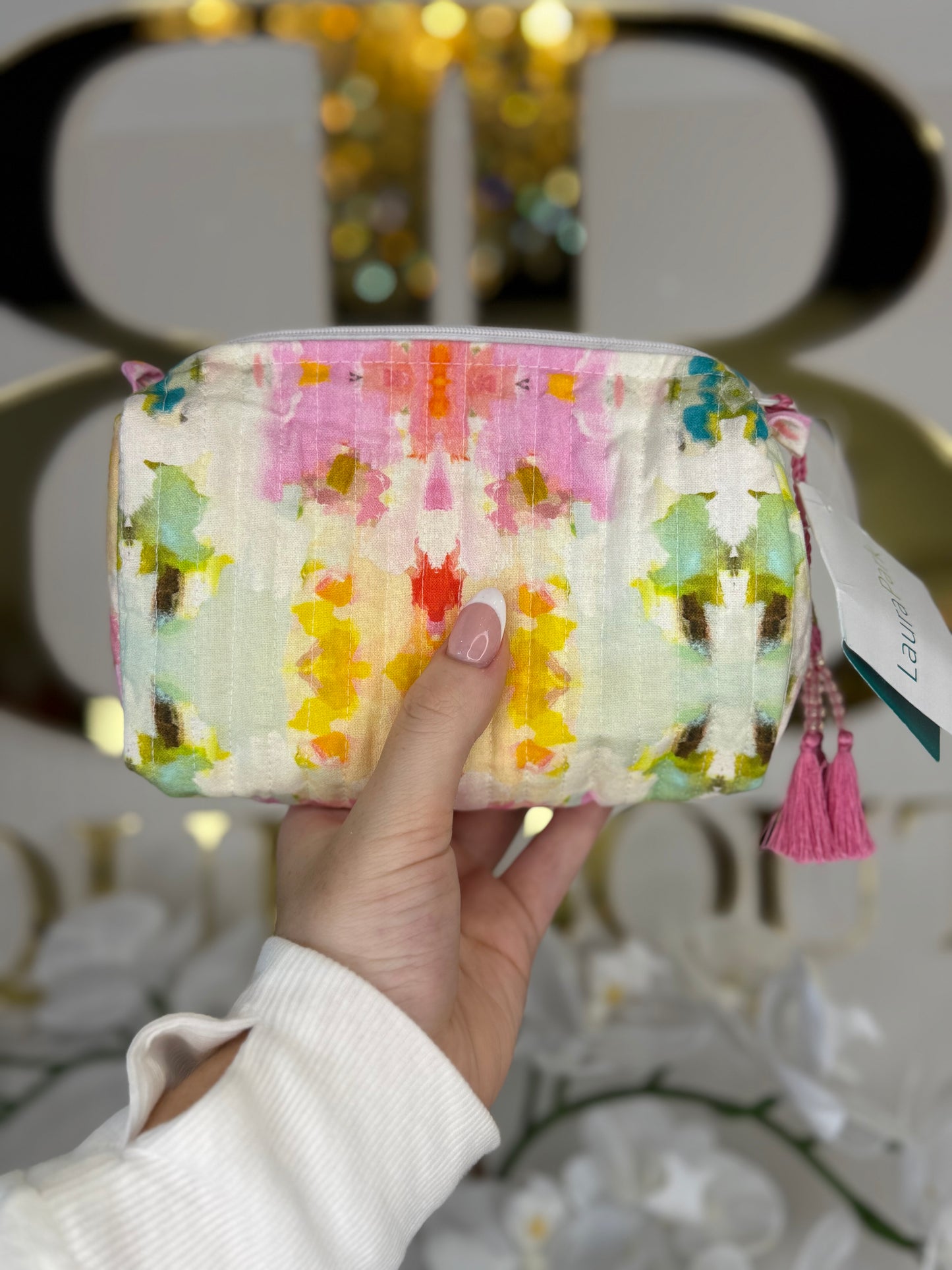BOUTIQUE LAURA PARK GIVERNY SMALL COSMETIC BAG IN HAND