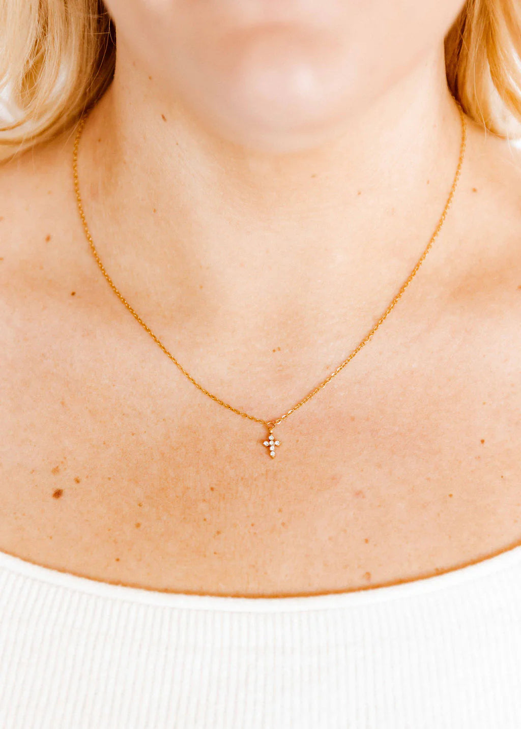 BOUTIQUE LINNY CO GOLD DIAMOND CROSS NECKLACE CARLY ON NECK