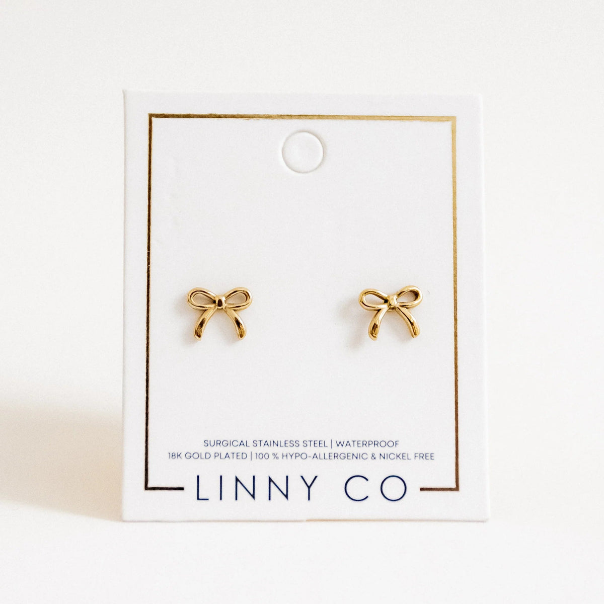 BOUTIQUE LINNY CO SCREWBACK STUD EARRINGS SADIE BOW GOLD ON CARD