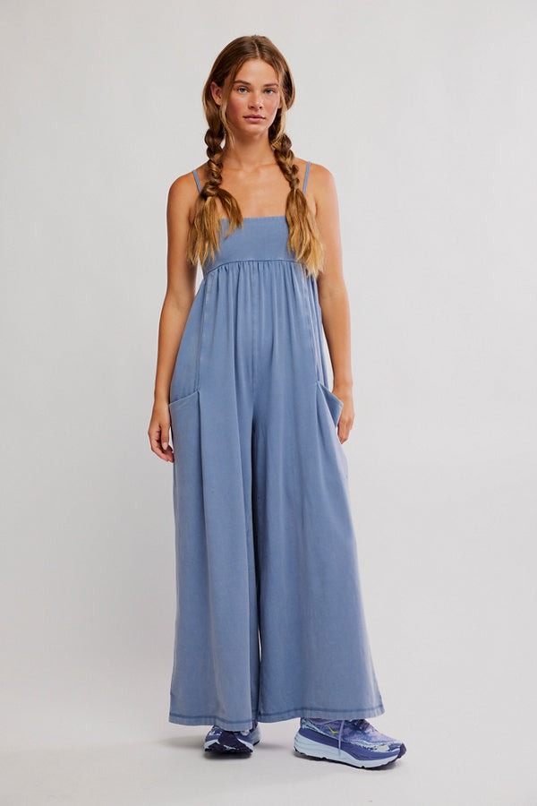 Woman wearing a blue dress on a white background