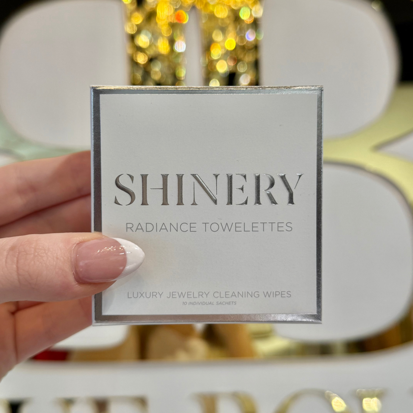 BOUTIQUE SHINERY RADIANCE TOWELETTES JEWELRY CLEANER WIPES IN HAND