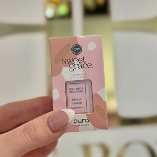 BOUTIQUE SWEET GRACE PURA DIFFUSER VIAL IN HAND