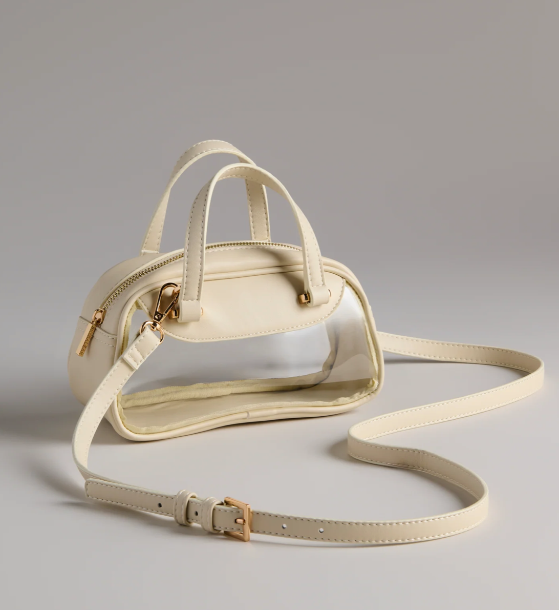 Beige handbag with a strap on a gray background