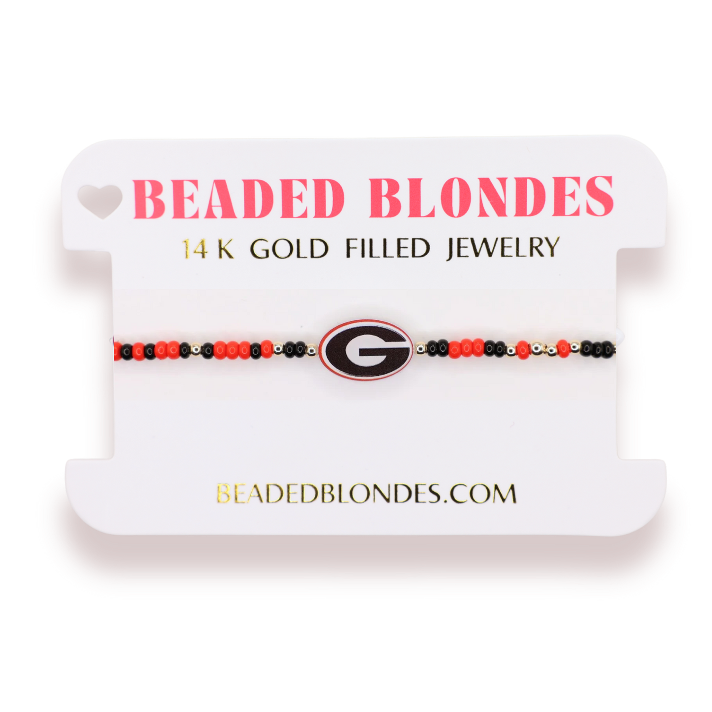 A beaded bracelet displayed on a white branded card. The bracelet features red, black, and blonde beads with a Georgia Bulldogs logo charm in the center.