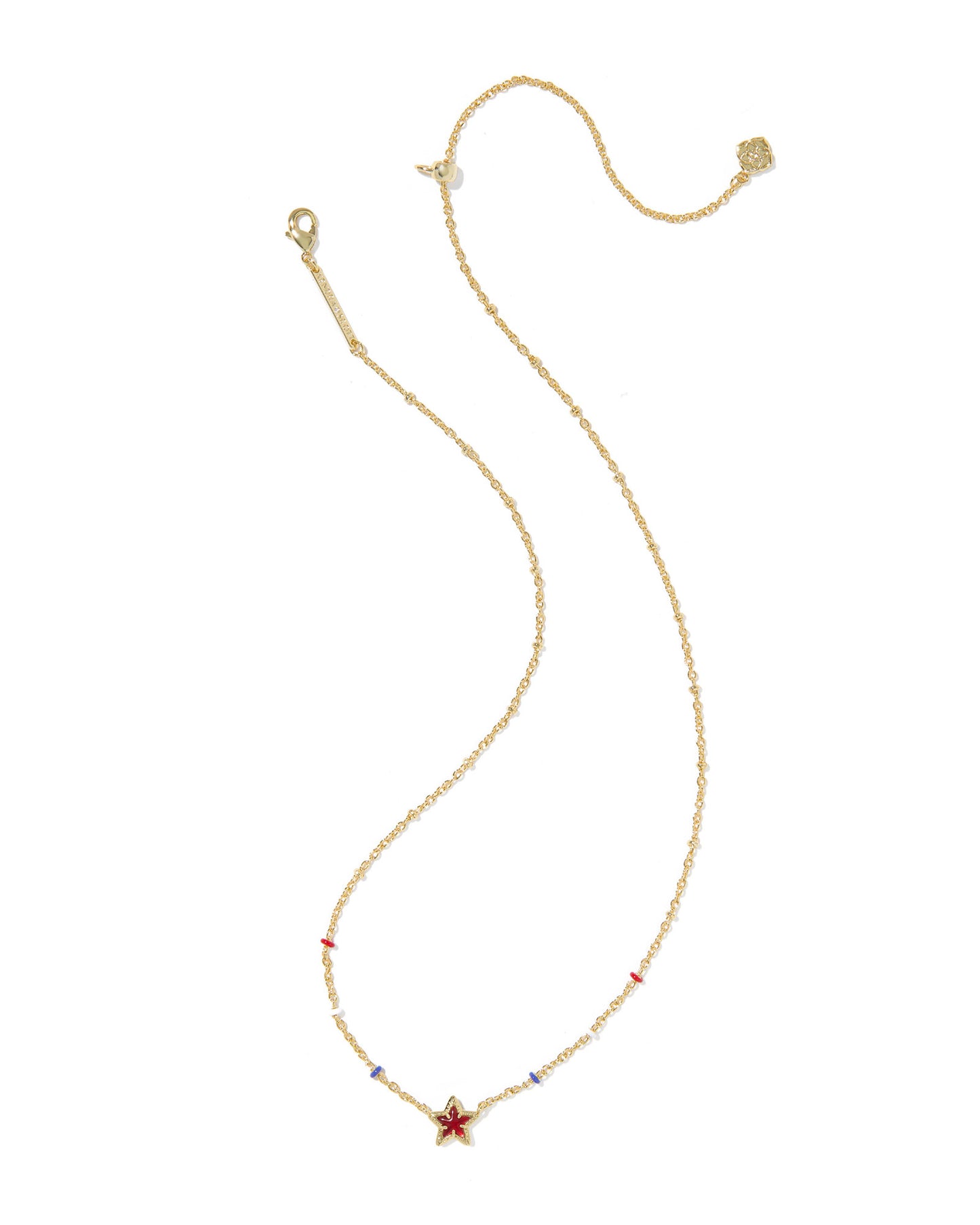 Gold necklace with starfish pendant on a white background