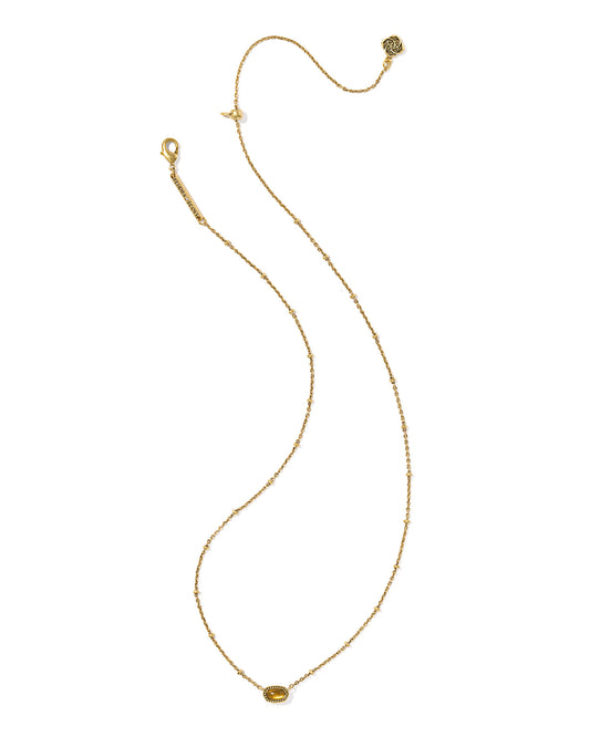 Gold necklace with a pendant on a white background