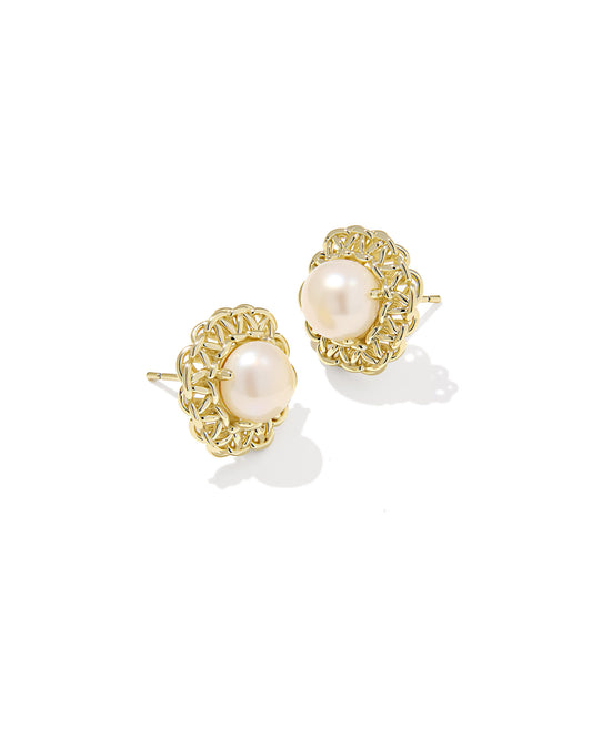 gold pearl earring studs on white background