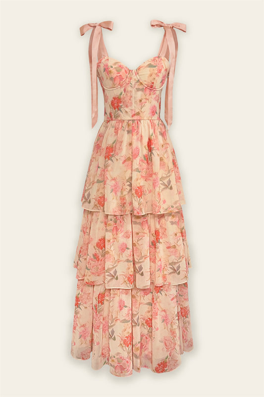 Floral dress with tiered layers on a white background
