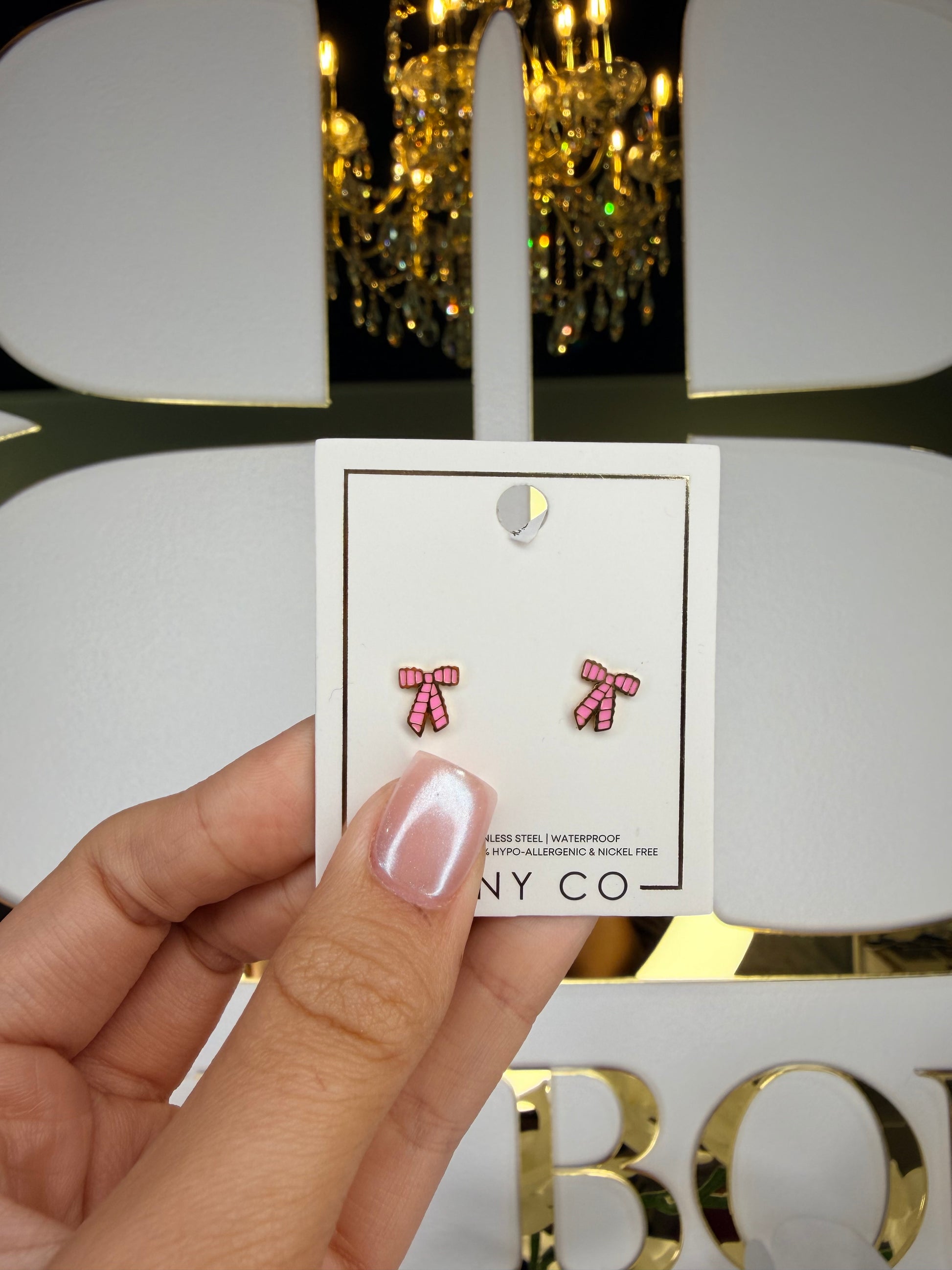 Linny co pink gold bow earrings 
