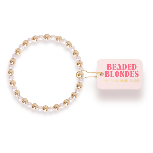 Beaded bracelet with 'Beaded Blondes' label on a white background
