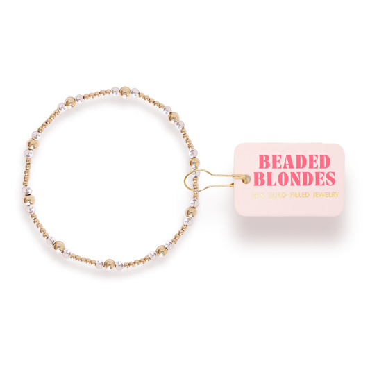 Beaded blonde bracelet with 'Beaded Blondes' packaging on a white background
