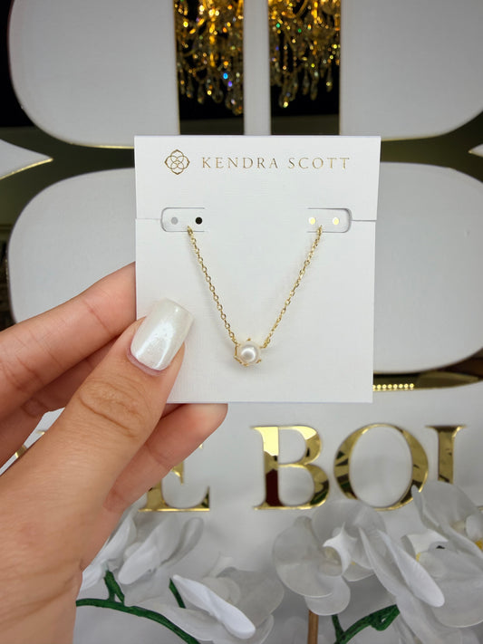 Gold Kendra Scott necklace with pearl pendant