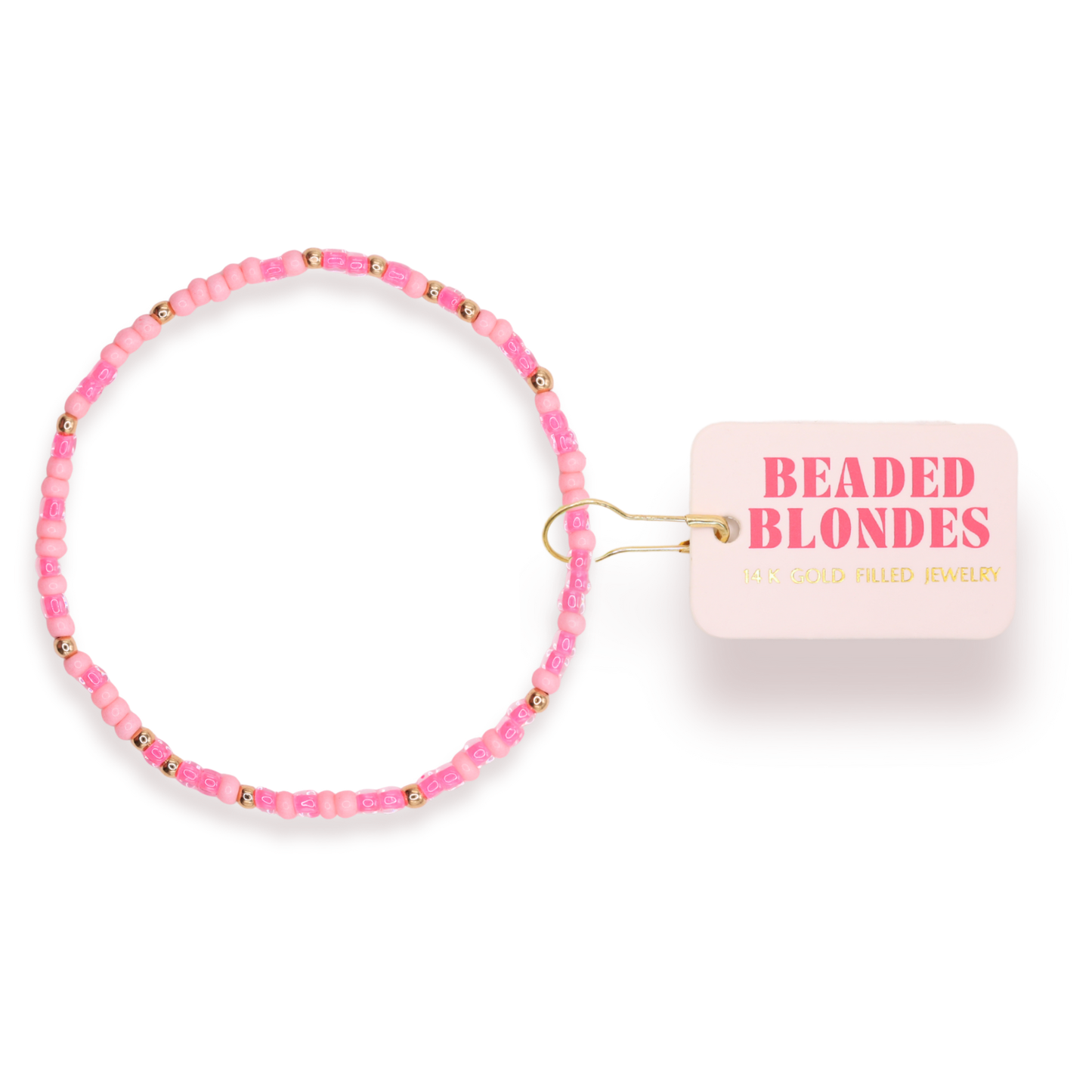 Pink beaded bracelet with a 'Beaded Blondes' label on a white background