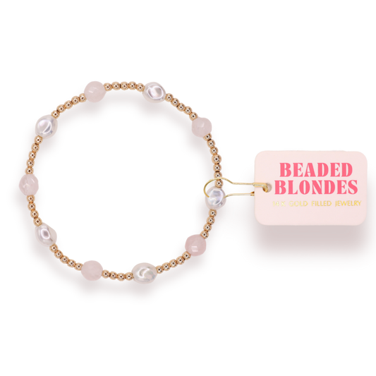 Beaded bracelet with a 'Beaded Blondes' tag on a white background