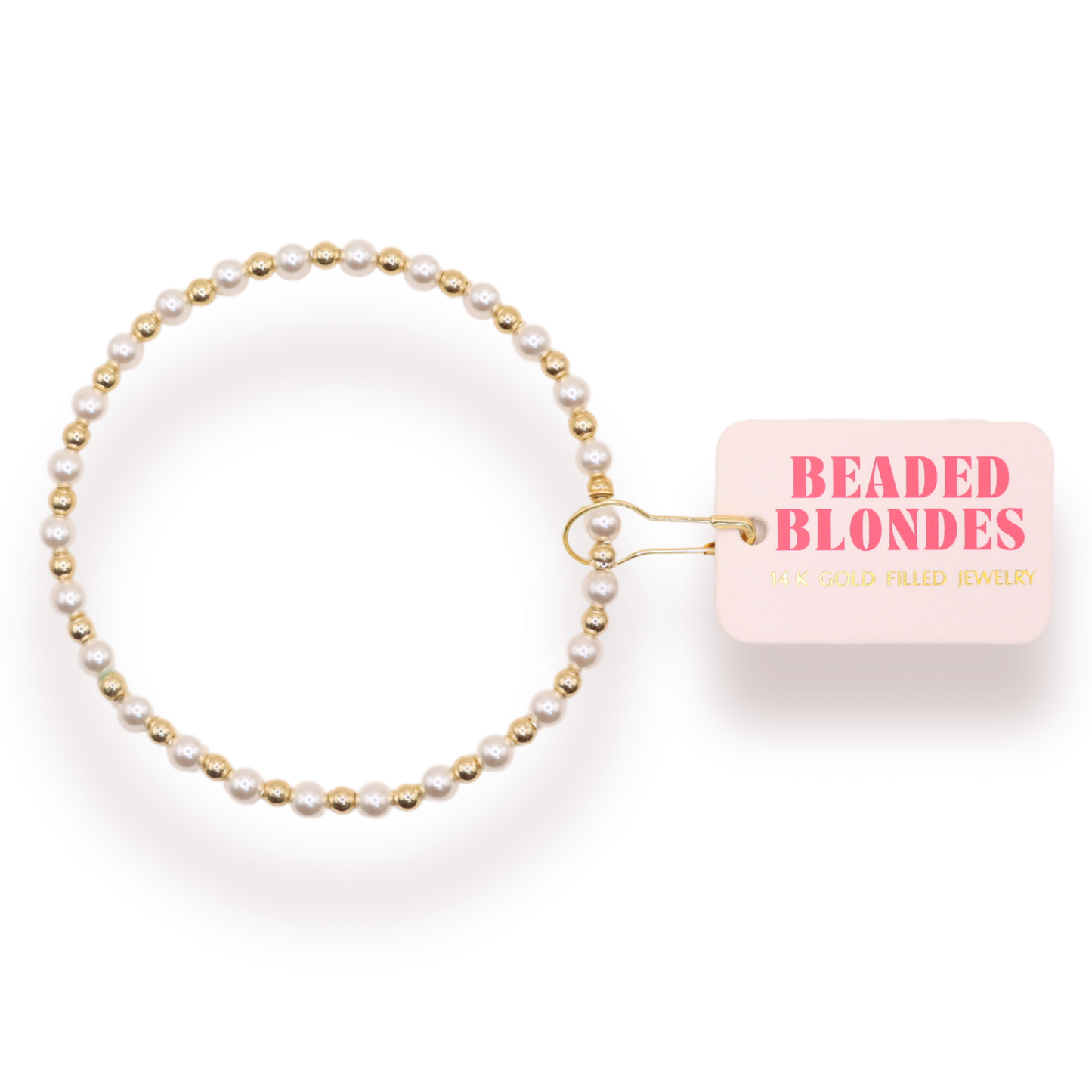 Beaded hair tie with 'Beaded Blondes' packaging on a white background