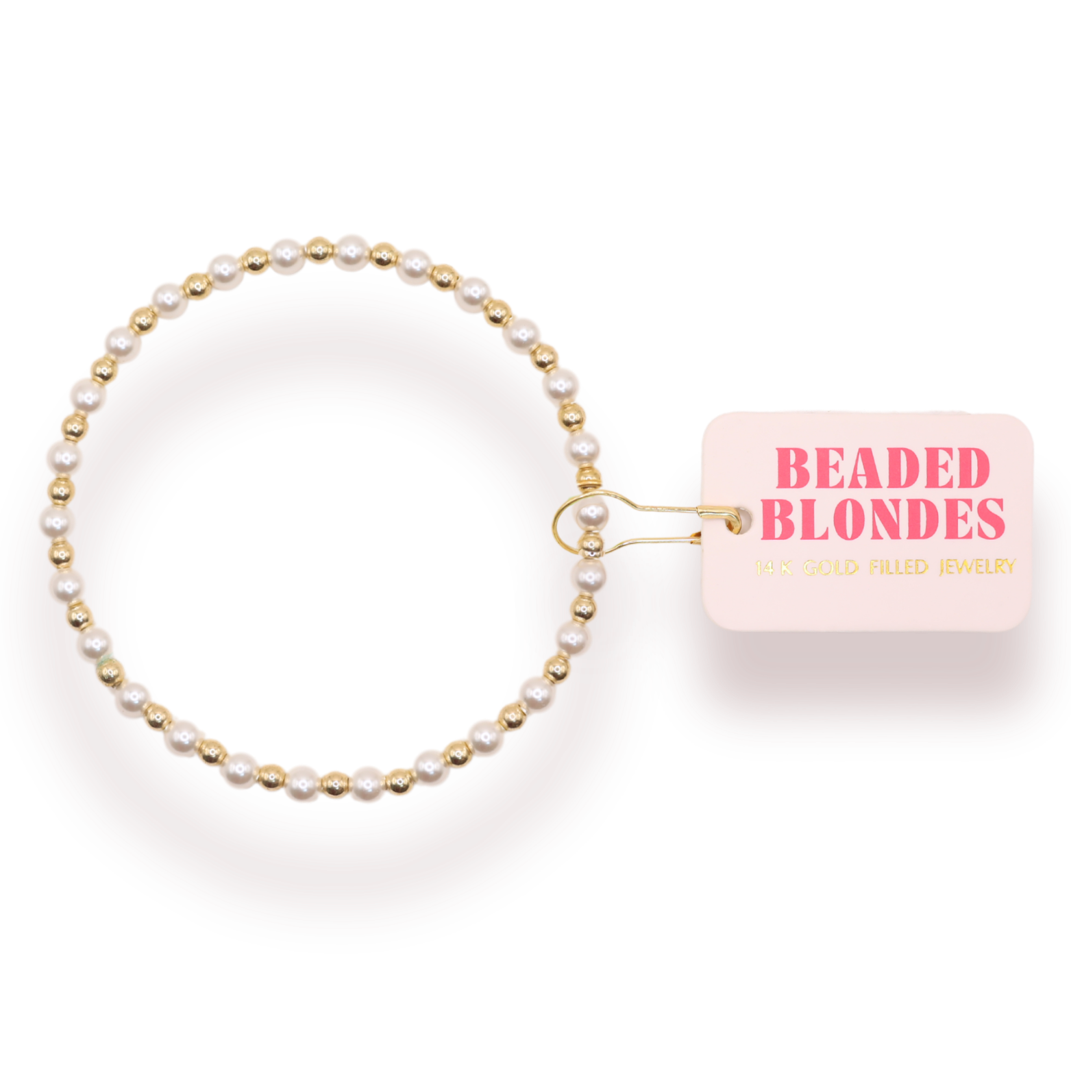 Beaded hair tie with 'Beaded Blondes' packaging on a white background