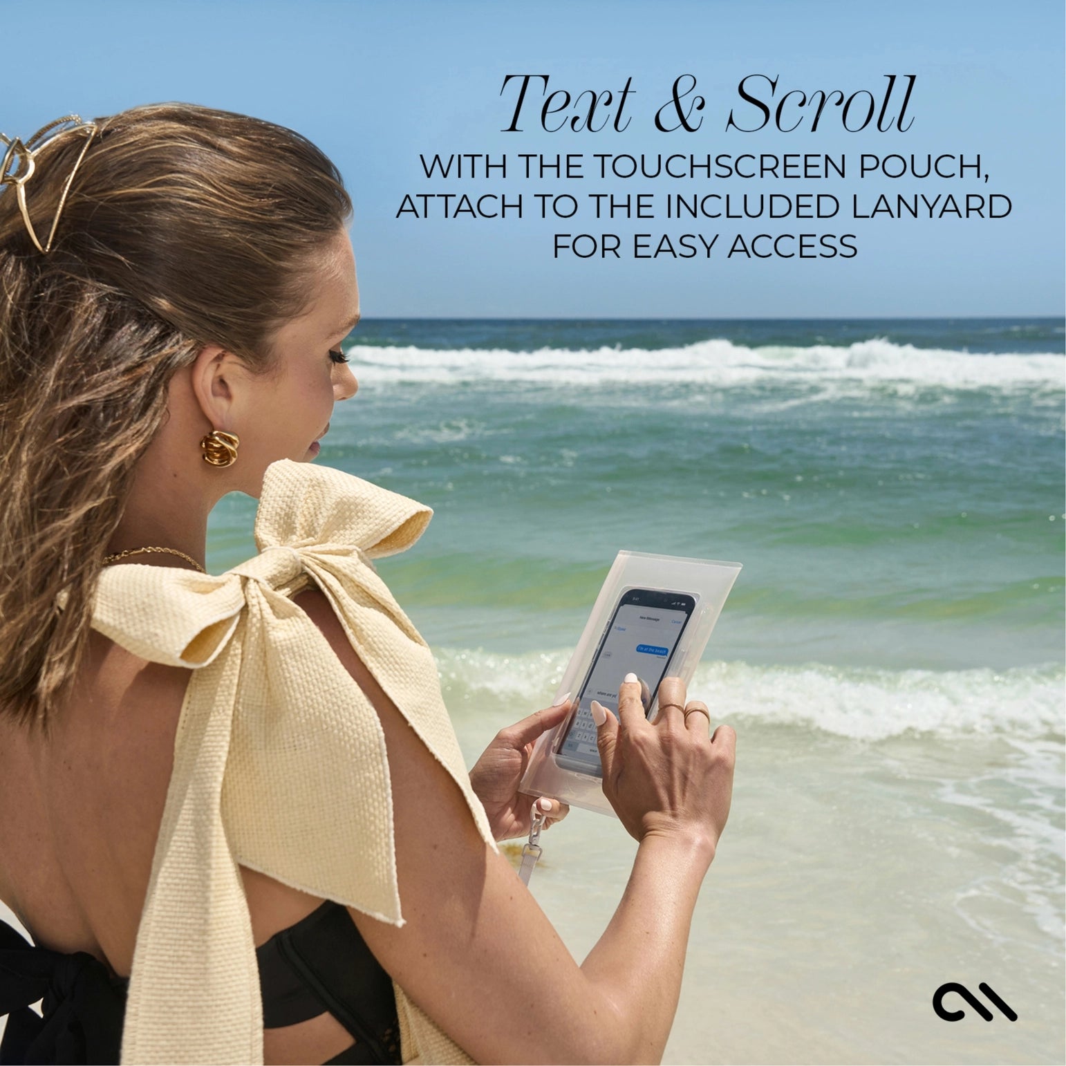 Woman using a touchscreen pouch on the beach with text overlay.
