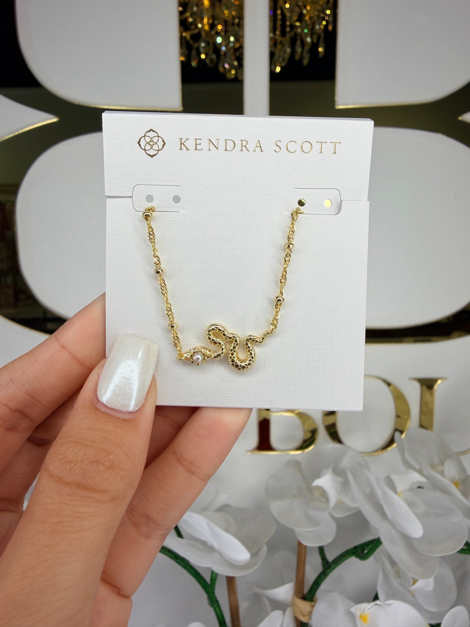 Gold Kendra Scott, snake necklace