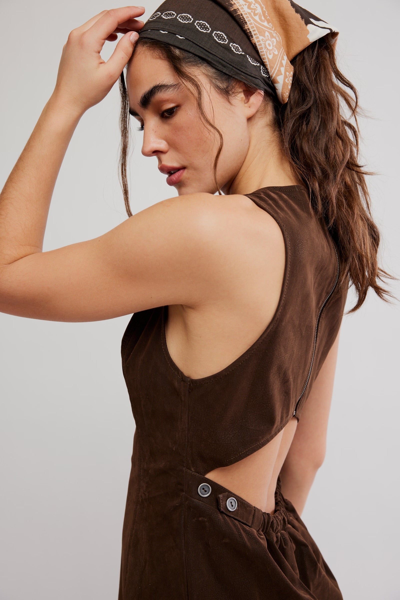 model wearing brown suede mini dress close up 