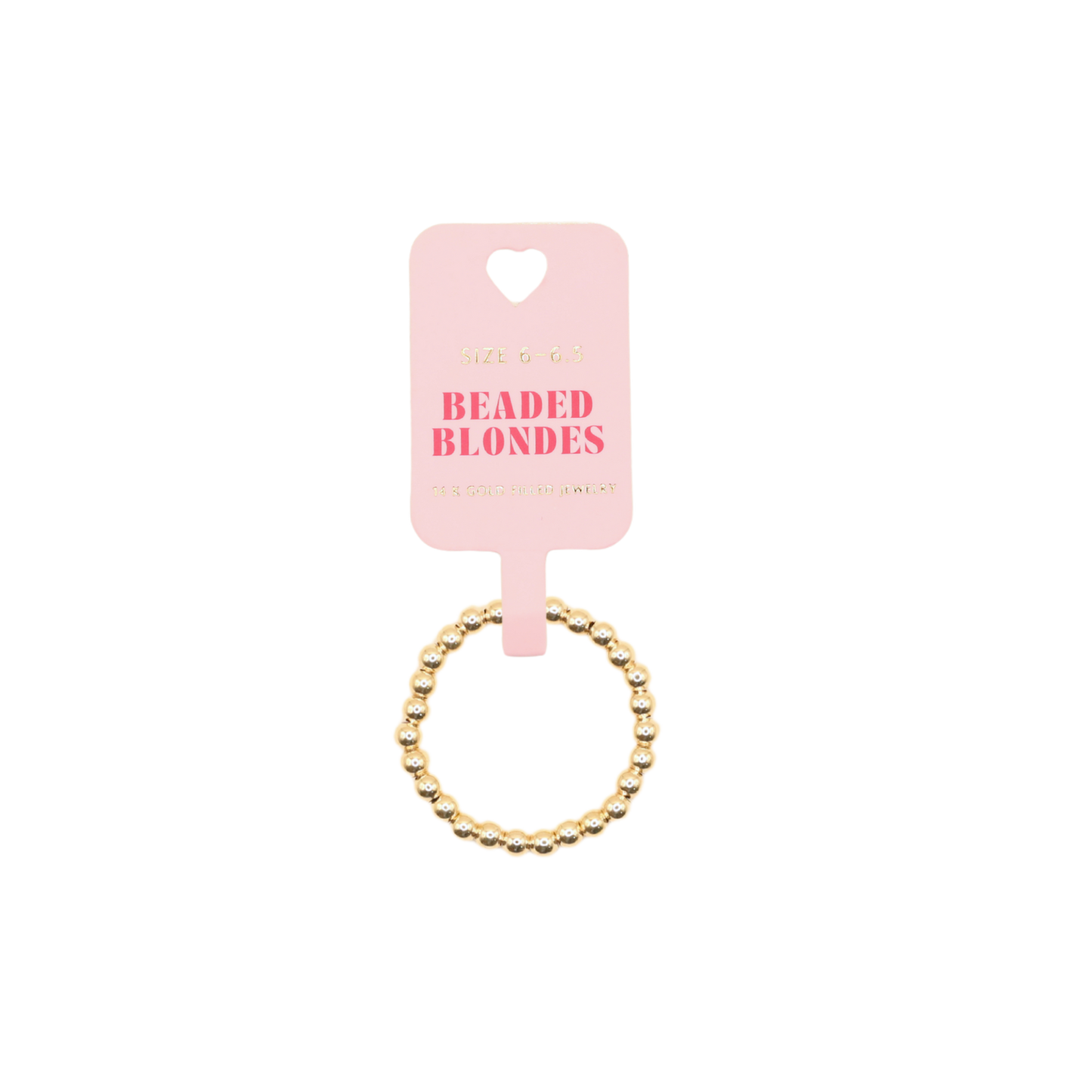 Pearl hair tie on a pink 'Beaded Blondes' card against a black background